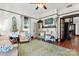 Living room with hardwood floors, fireplace, and charming details at 410 7Th St, Spencer, NC 28159