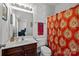 Well-lit bathroom with a toilet and shower at 4126 Walker Rd, Charlotte, NC 28211