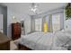 Bright bedroom with king bed, dresser, and access to private balcony at 4126 Walker Rd, Charlotte, NC 28211