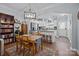 Charming dining area with a wooden table and chairs near the kitchen at 4126 Walker Rd, Charlotte, NC 28211