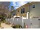 Townhouse exterior with private fenced yard at 4126 Walker Rd, Charlotte, NC 28211