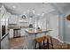 Modern kitchen with stainless steel appliances and granite countertops at 4126 Walker Rd, Charlotte, NC 28211