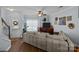 Bright living room with hardwood floors, and a view of the entryway and staircase at 4126 Walker Rd, Charlotte, NC 28211