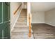 Carpeted stairs connecting the floors of the home at 4762 Old Lantern Way, Charlotte, NC 28212