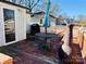 Deck with table, chairs, and fire pit for relaxing at 503 E 10Th St, Kannapolis, NC 28083