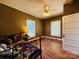 Cozy bedroom featuring wood floors and a ceiling fan at 503 E 10Th St, Kannapolis, NC 28083