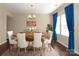 Elegant dining room with hardwood floors and large windows at 5030 Monacan Way, Indian Land, SC 29707