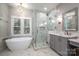 Luxurious bathroom with marble finishes and soaking tub at 517 Stuart Ridge None, Cramerton, NC 28032