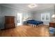 Charming bedroom with hardwood floors and ensuite bathroom at 517 Stuart Ridge None, Cramerton, NC 28032