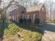 Brick home with attached garage and manicured landscaping at 517 Stuart Ridge None, Cramerton, NC 28032