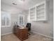 Home office with built-in shelving and hardwood desk at 517 Stuart Ridge None, Cramerton, NC 28032