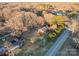 Overhead view of house, yard, and surrounding neighborhood at 5229 Mt Holly Huntersville Rd, Charlotte, NC 28216