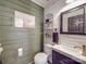 Modern powder room with shiplap walls and sleek vanity at 5229 Mt Holly Huntersville Rd, Charlotte, NC 28216