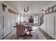 Bright dining room features a wooden table and chandelier at 5229 Mt Holly Huntersville Rd, Charlotte, NC 28216