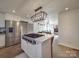 Modern kitchen features stainless steel appliances and an island at 5229 Mt Holly Huntersville Rd, Charlotte, NC 28216