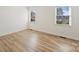 Bright bedroom with hardwood floors and neutral walls at 533 Wakefield Dr # B, Charlotte, NC 28209