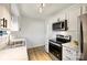 Updated kitchen featuring stainless steel appliances and white shaker cabinets at 533 Wakefield Dr # B, Charlotte, NC 28209