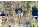 Aerial view of house and surrounding trees at 5424 Amanda Ln, Belmont, NC 28012