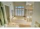 Bathroom with a soaking tub, walk-in shower, and updated fixtures at 5424 Amanda Ln, Belmont, NC 28012