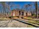 Spacious brick home with a large yard and mature trees at 5424 Amanda Ln, Belmont, NC 28012