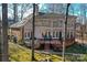 House back view, showcasing large deck and backyard at 5424 Amanda Ln, Belmont, NC 28012