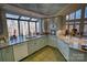 Kitchen with granite countertops, light blue cabinets, and a breakfast bar at 5424 Amanda Ln, Belmont, NC 28012