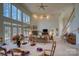 Open floor plan living room and dining area with high ceilings and lots of light at 5424 Amanda Ln, Belmont, NC 28012