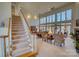 Two-story living room with hardwood floors, large windows and fireplace at 5424 Amanda Ln, Belmont, NC 28012