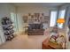 Cozy office with built-in shelving and a comfortable sofa at 5424 Amanda Ln, Belmont, NC 28012