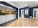 Modern built-in bar with white cabinets and quartz countertop at 59 Ridgeport Rd, Clover, SC 29710