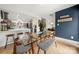 Open concept dining area with glass table and modern chairs at 59 Ridgeport Rd, Clover, SC 29710