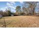 Large backyard with a storage shed at 6208 Karenstone Dr, Charlotte, NC 28215