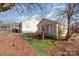 Backyard view with shed and patio area at 6208 Karenstone Dr, Charlotte, NC 28215