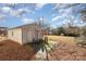 Backyard with shed, patio, and trampoline at 6208 Karenstone Dr, Charlotte, NC 28215