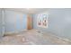 Bedroom with light blue walls and window view at 6208 Karenstone Dr, Charlotte, NC 28215