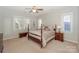 Spacious bedroom with double bed and two nightstands at 626 Lorain Nw Ave, Concord, NC 28027