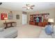 Spacious bonus room with TV and comfortable seating at 626 Lorain Nw Ave, Concord, NC 28027