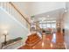 Two-story entry with hardwood floors, a staircase, and views to the living room at 626 Lorain Nw Ave, Concord, NC 28027