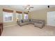 Spacious Gathering room featuring a large sectional sofa and ample natural light at 626 Lorain Nw Ave, Concord, NC 28027