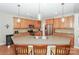 Large kitchen with an island, stainless steel appliances, and wood cabinets at 626 Lorain Nw Ave, Concord, NC 28027