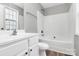 Clean bathroom with a tub/shower combo and white vanity at 6603 Wandering Creek Dr, Charlotte, NC 28216