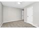 Spacious bedroom featuring neutral walls, carpet flooring, and ample closet space at 6603 Wandering Creek Dr, Charlotte, NC 28216