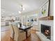 Bright dining room with a view into the kitchen and sunroom at 6633 Old Reid Rd, Charlotte, NC 28210