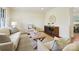 Spacious living room featuring a wood coffee table and neutral decor at 6633 Old Reid Rd, Charlotte, NC 28210