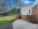 Brick patio and stairs leading to a deck at 6633 Old Reid Rd, Charlotte, NC 28210