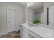 Double vanity bathroom with a shower/tub combo at 8138 Paw Club Dr, Charlotte, NC 28214