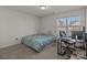 Bedroom with queen-size bed and workspace at 8138 Paw Club Dr, Charlotte, NC 28214