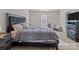 Spacious bedroom with king-size bed and ample closet space at 8138 Paw Club Dr, Charlotte, NC 28214