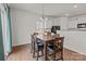 Bright dining area with table and chairs near sliding door at 8138 Paw Club Dr, Charlotte, NC 28214