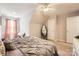 Relaxing bedroom with neutral decor, cozy bed, and soft lighting at 8636 Robinson Forest Dr, Charlotte, NC 28277